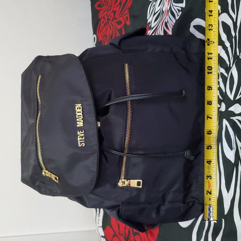 Steve Madden Black Drawstring Backpack with Gold Zippers - Picture 3 of 6